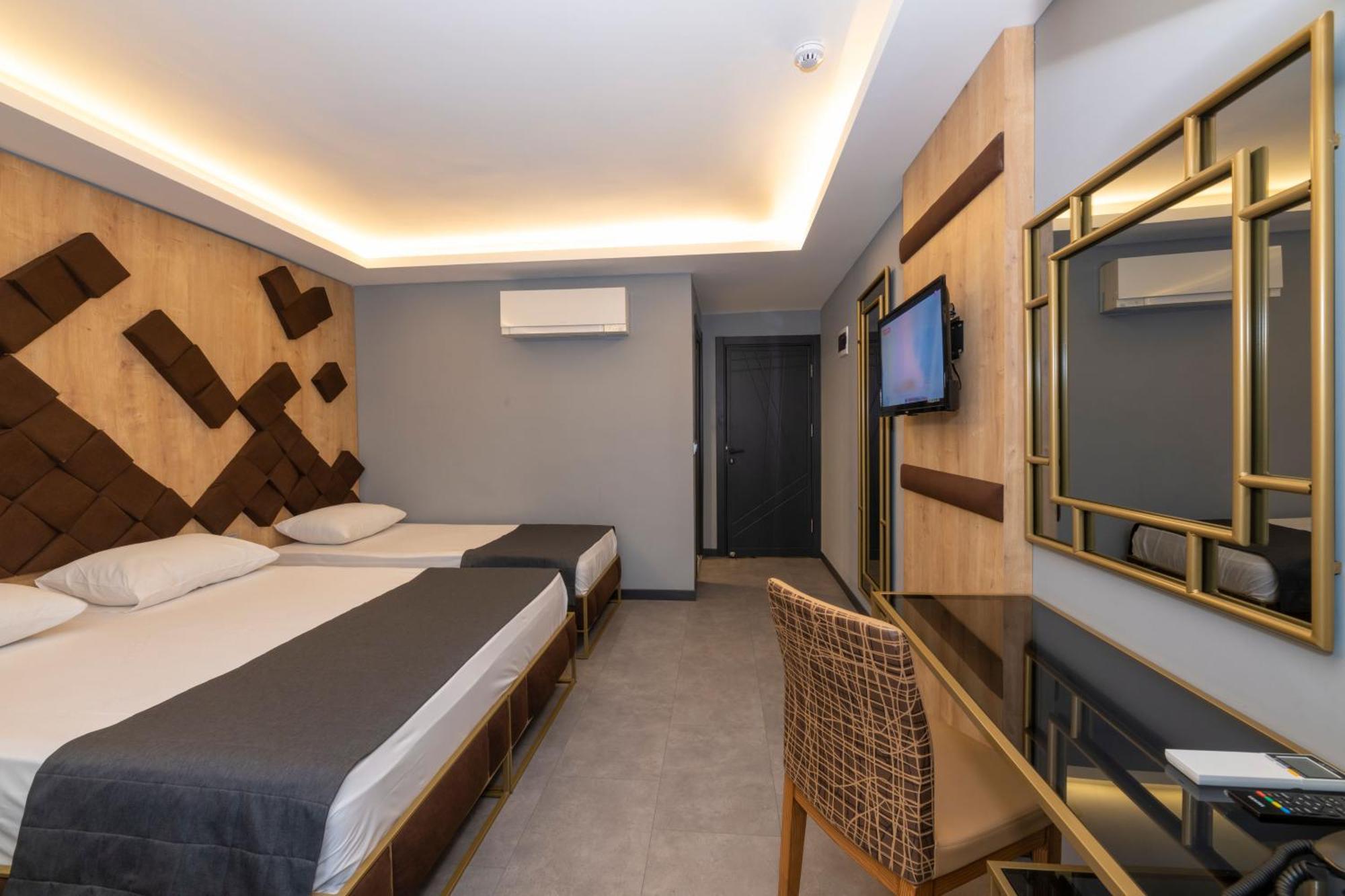 Deluxe Quadruple Room,1034256761:JPEG