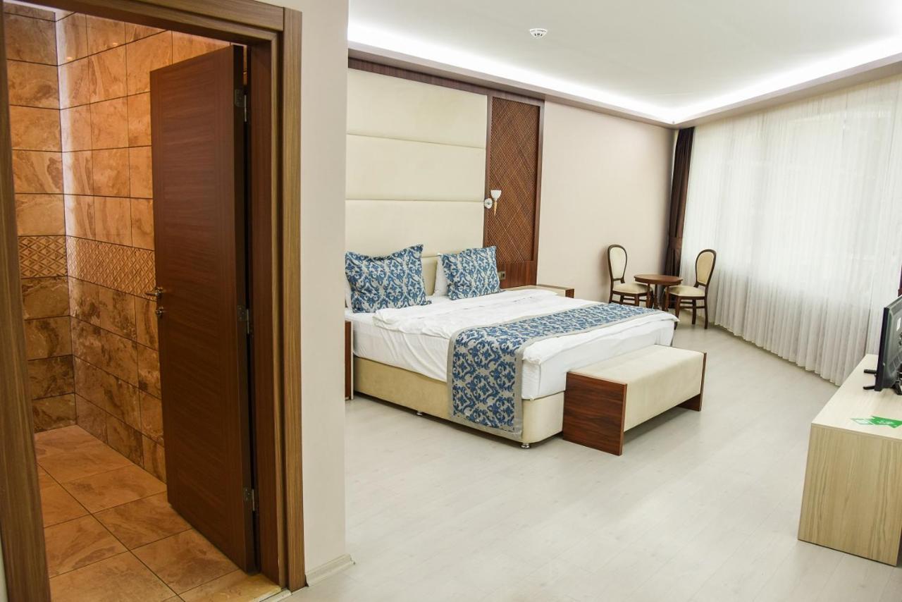 Suite mit Kingsize-Bett und Balkon