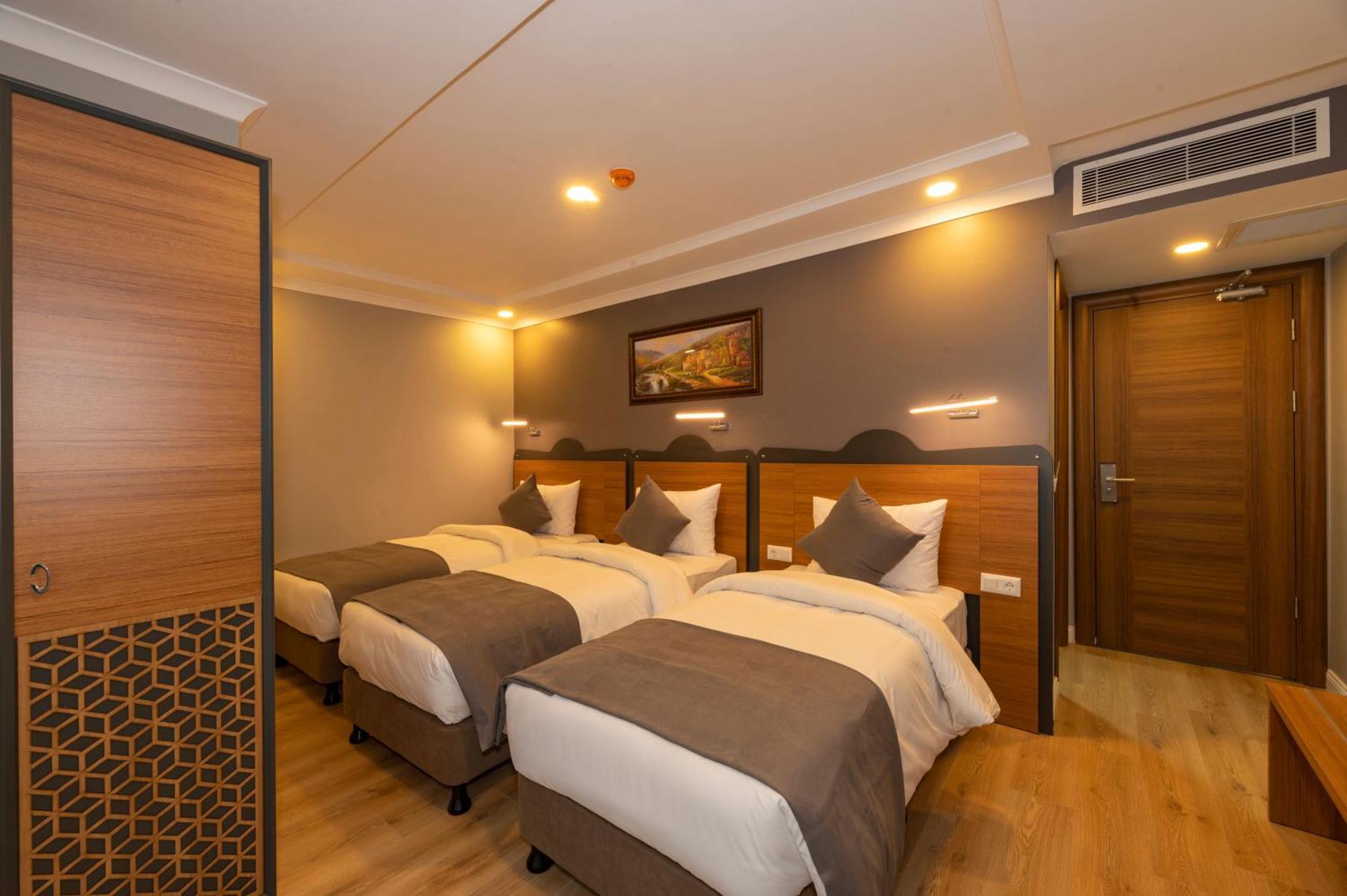 Deluxe Triple Room