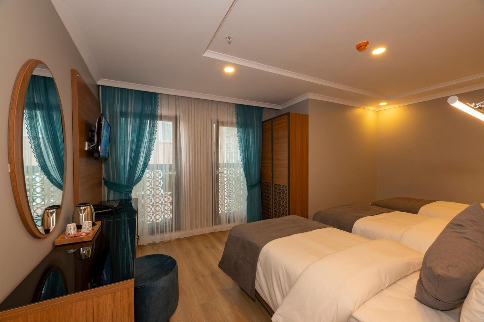 Deluxe Triple Room
