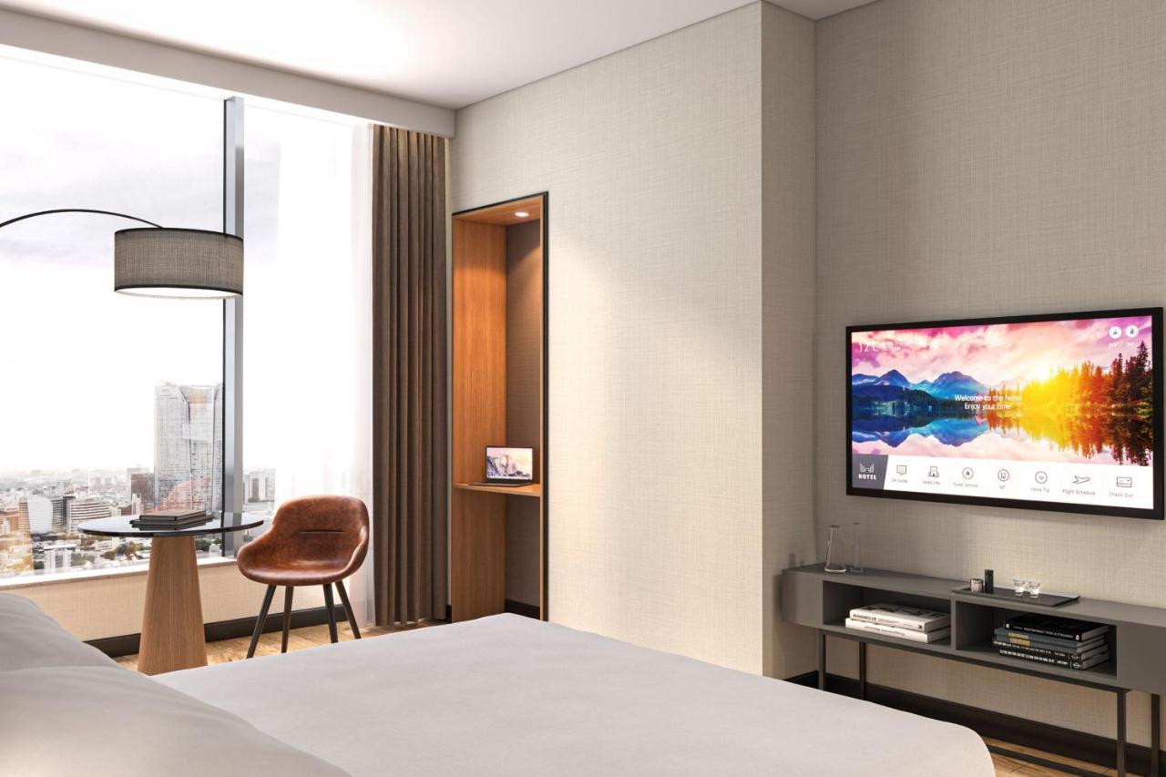 Deluxe Kamer met Kingsize Bed en Slaapbank - Uitzicht op de Stad