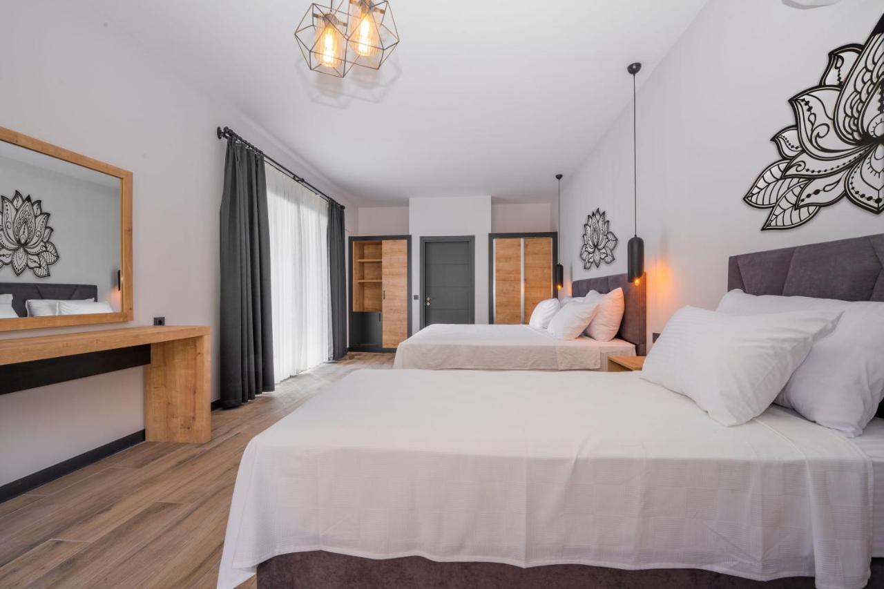 CAROB SUITES,1403830037:JPEG