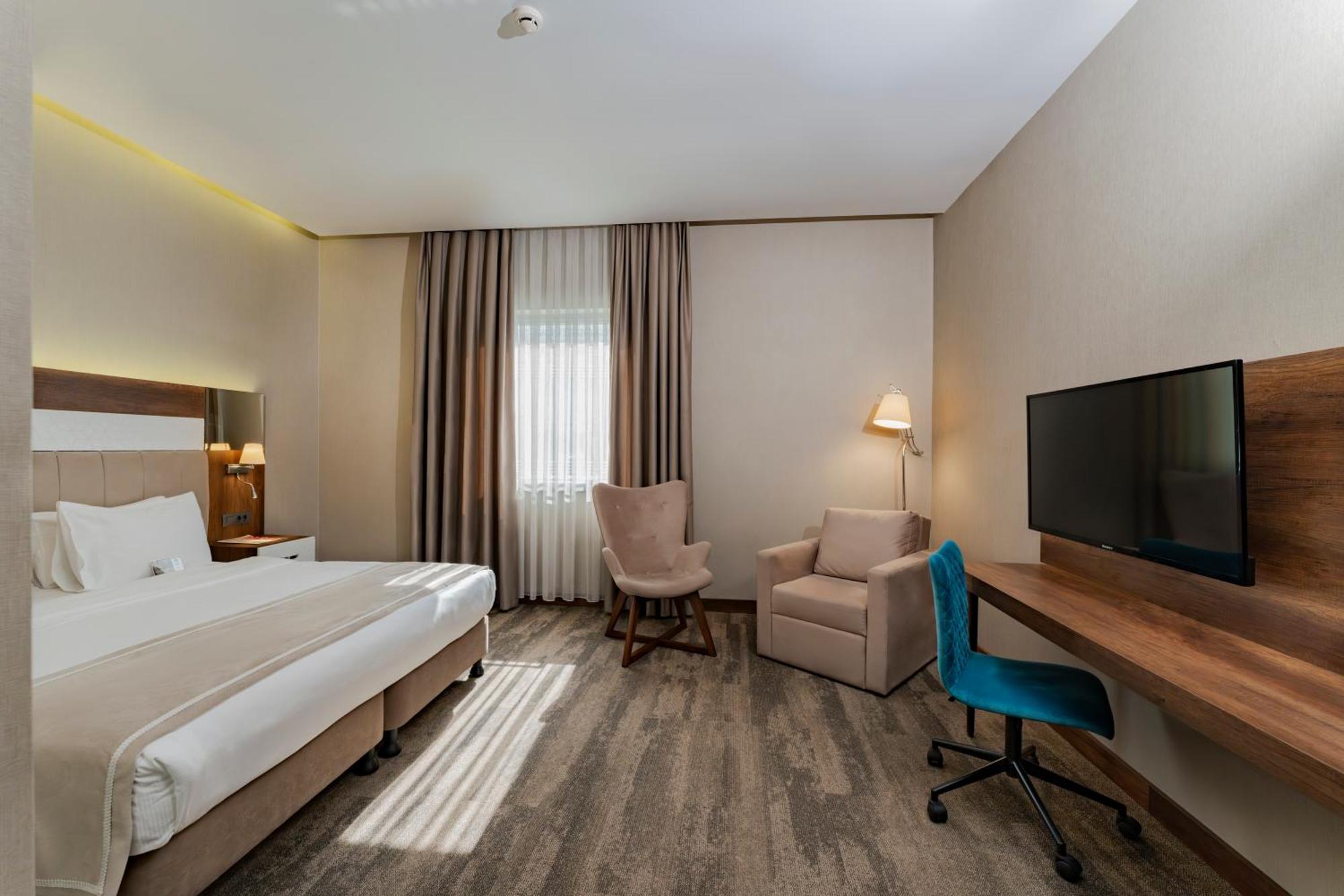 Quarto Deluxe com Cama de Casal ou 2 de Solteiro