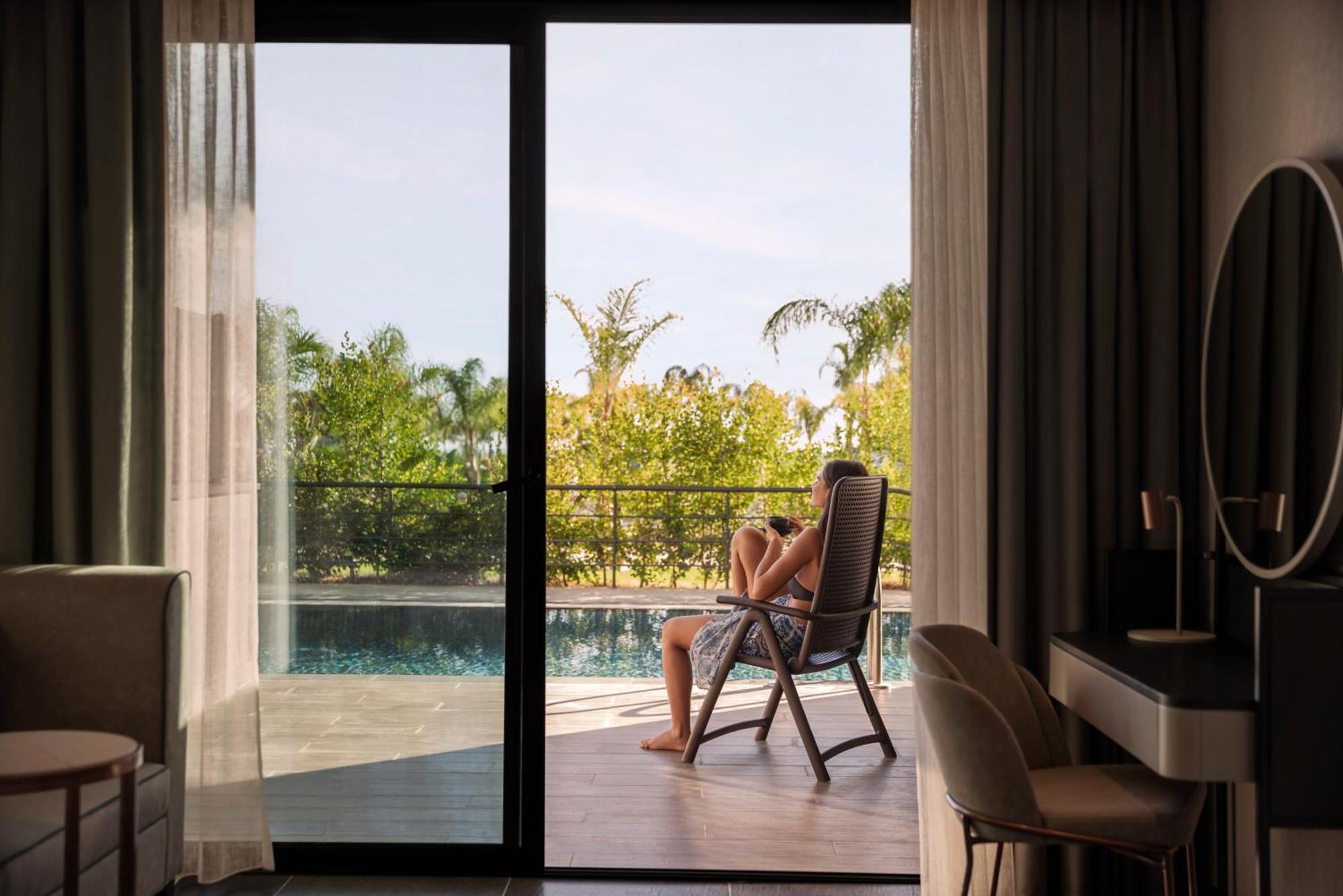 Dreibettzimmer mit Gartenblick