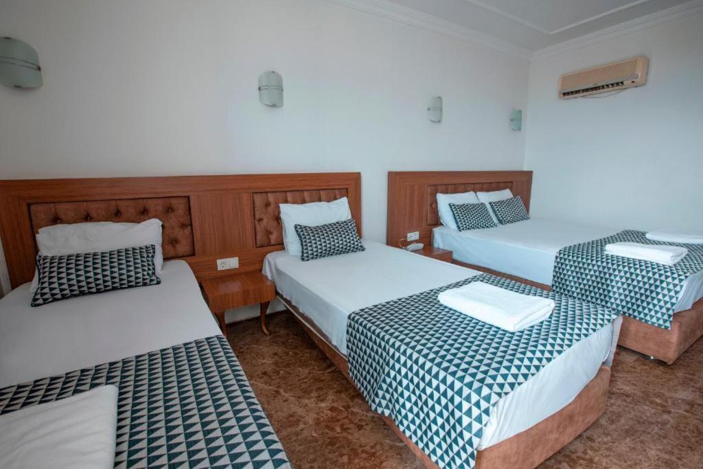 Chambre Quadruple avec Vue Latérale sur la Mer