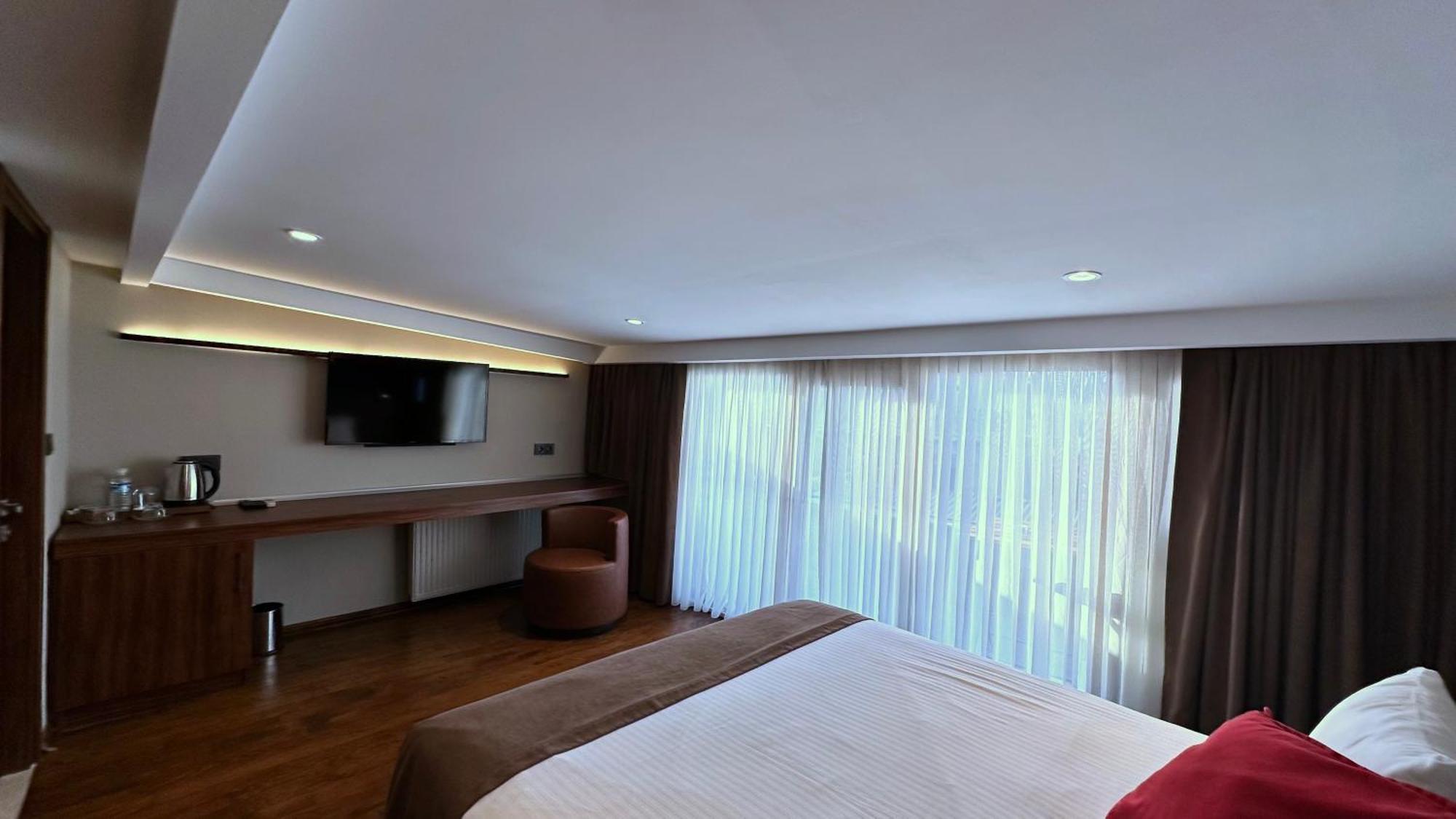 Quarto com Cama Queen-Size e Varanda