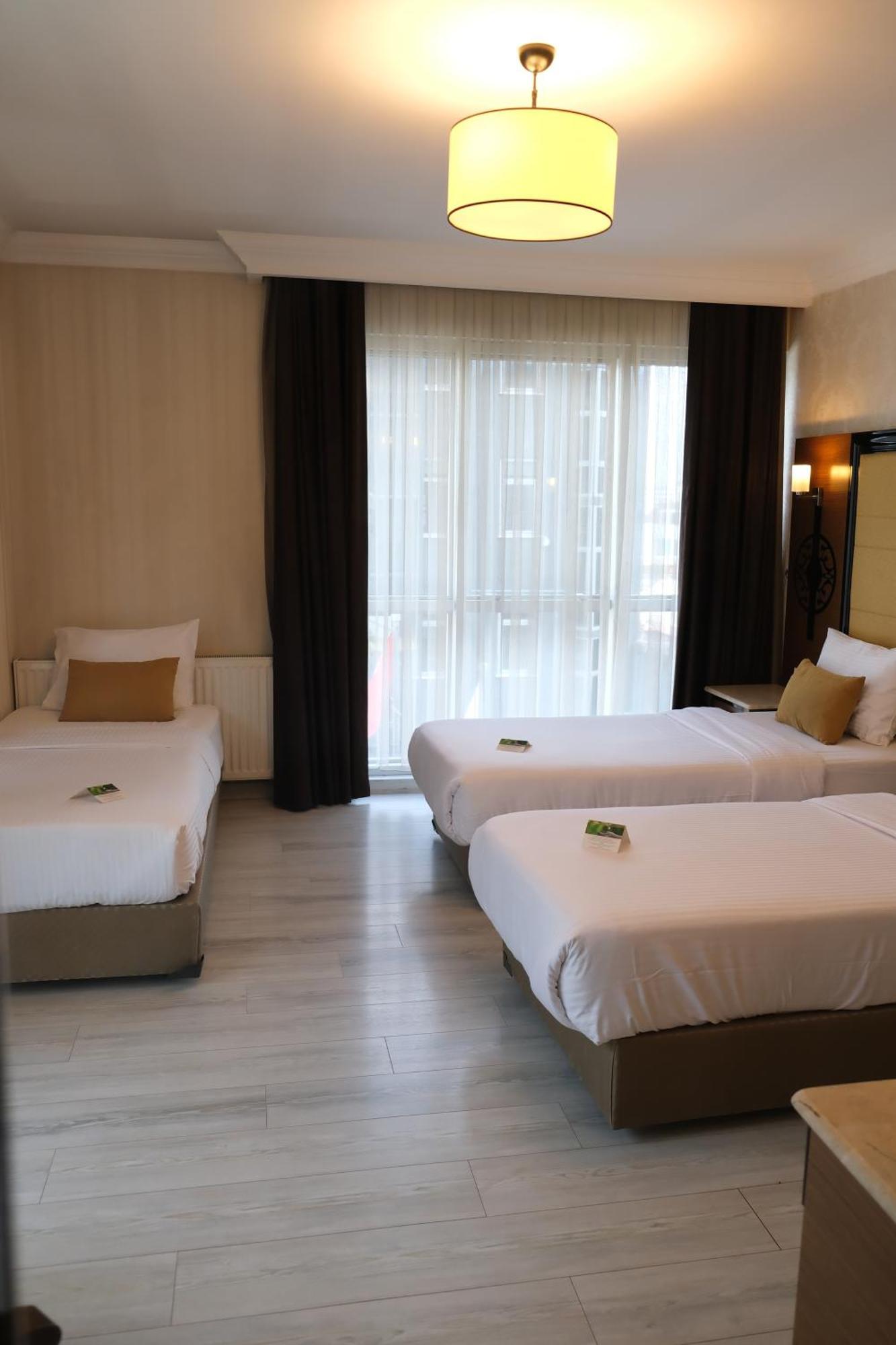 Deluxe Triple Room