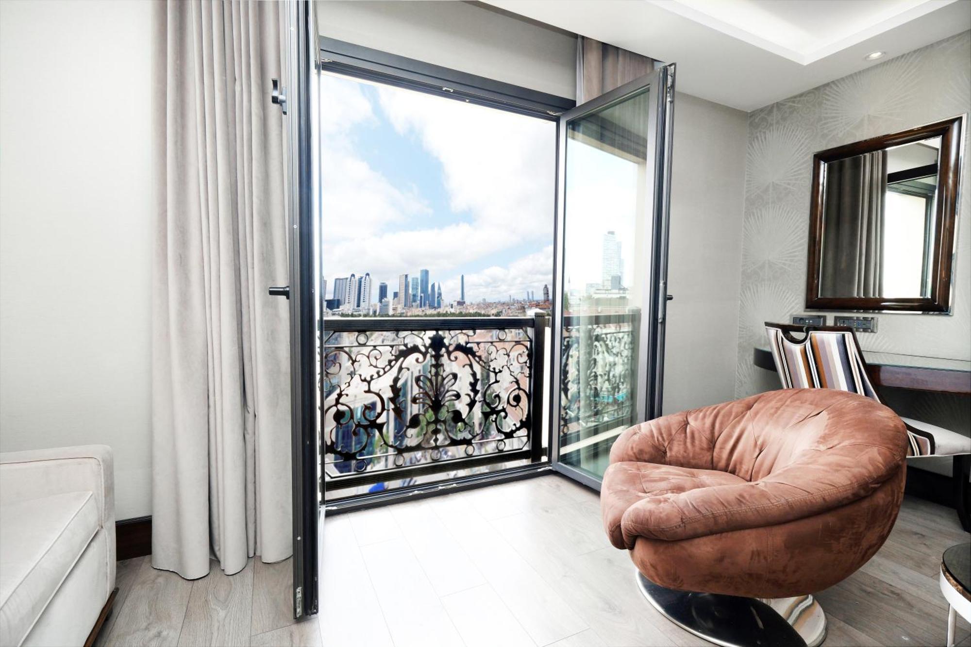 Habitación Doble Deluxe con cama extragrande y vistas a la ciudad