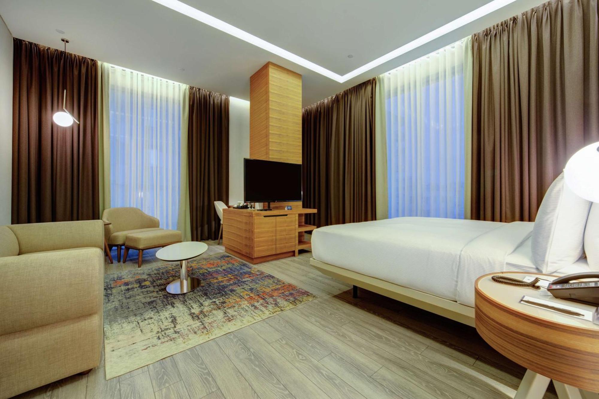 Deluxe Eckzimmer mit Kingsize-Bett