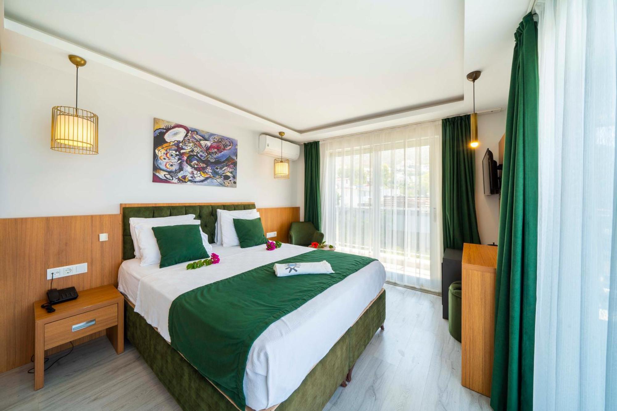 Doppelzimmer mit Balkon und Meerblick