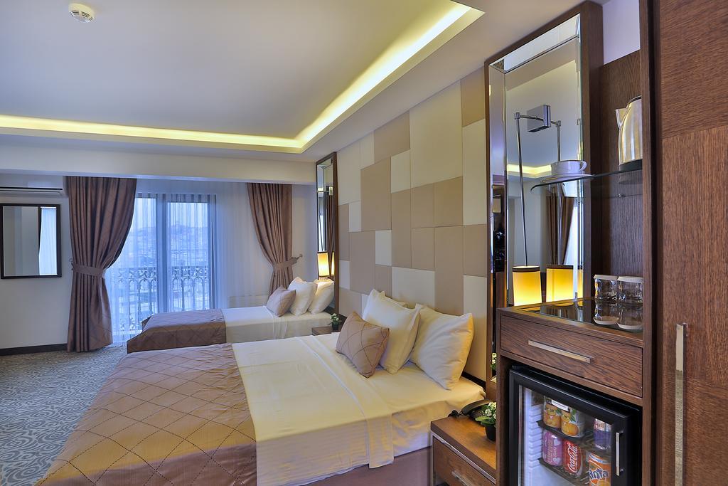Deluxe Triple Room Sea View,847007843:JPEG