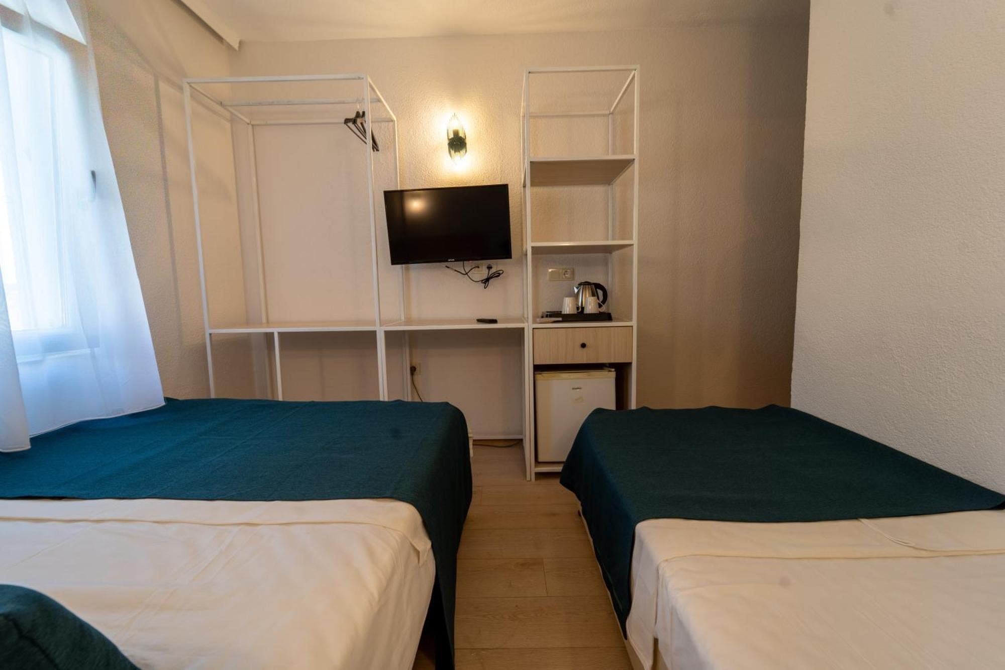 Driepersoonskamer met Uitzicht op de Stad