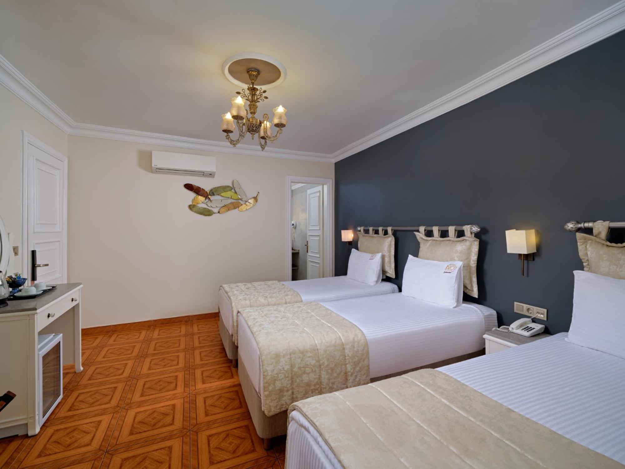 Chambre Triple - Vue sur Ville