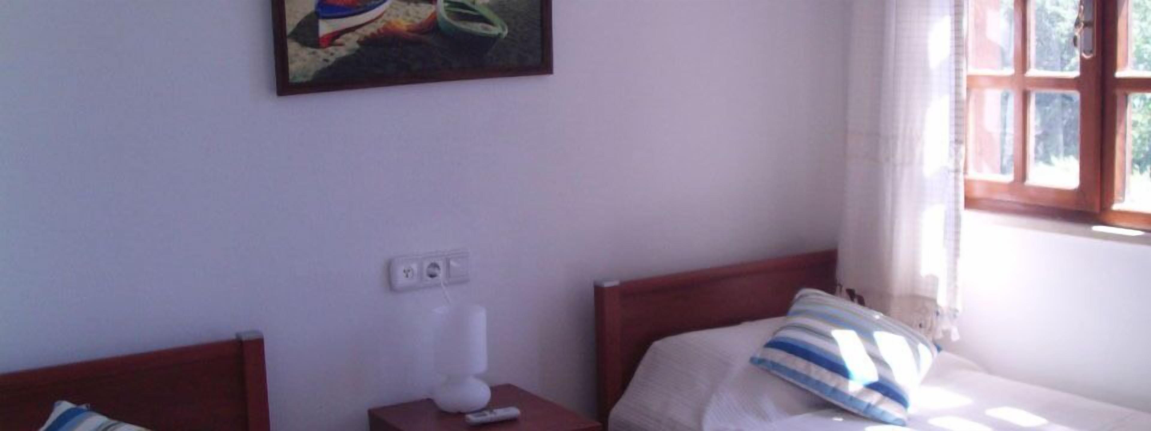 Doppel- oder Zweibettzimmer