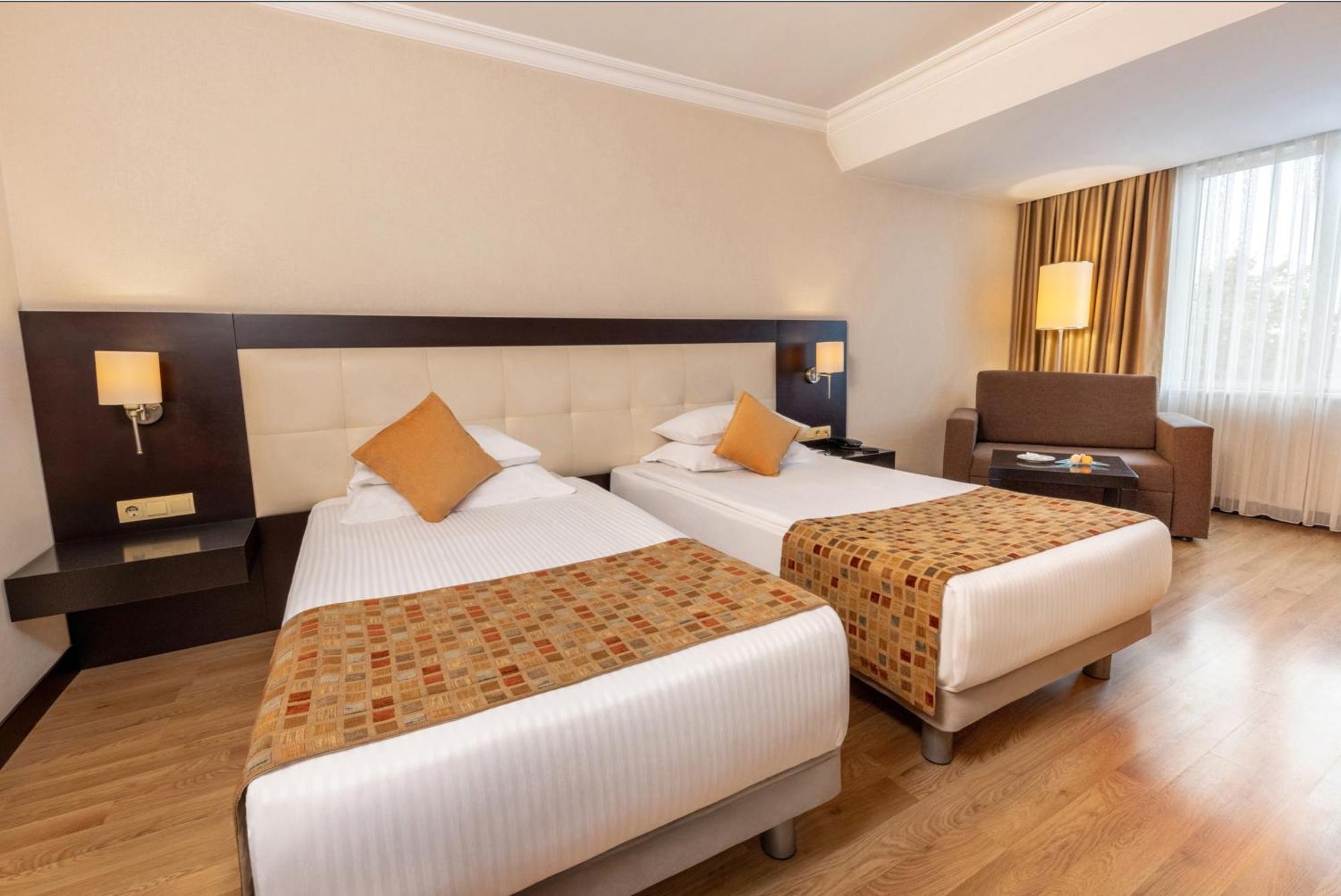 Quarto Deluxe com 2 Camas de Solteiro com Vista da Cidade