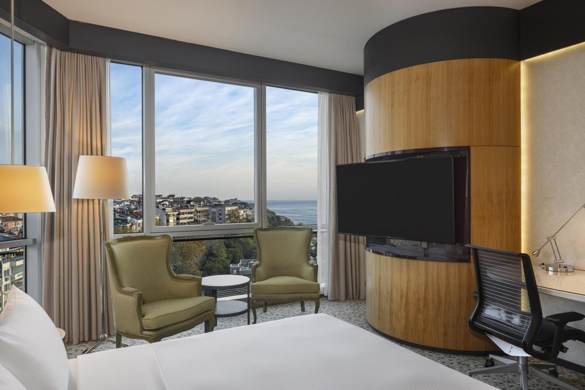 Habitación Deluxe con vistas parciales al mar - cama extragrande