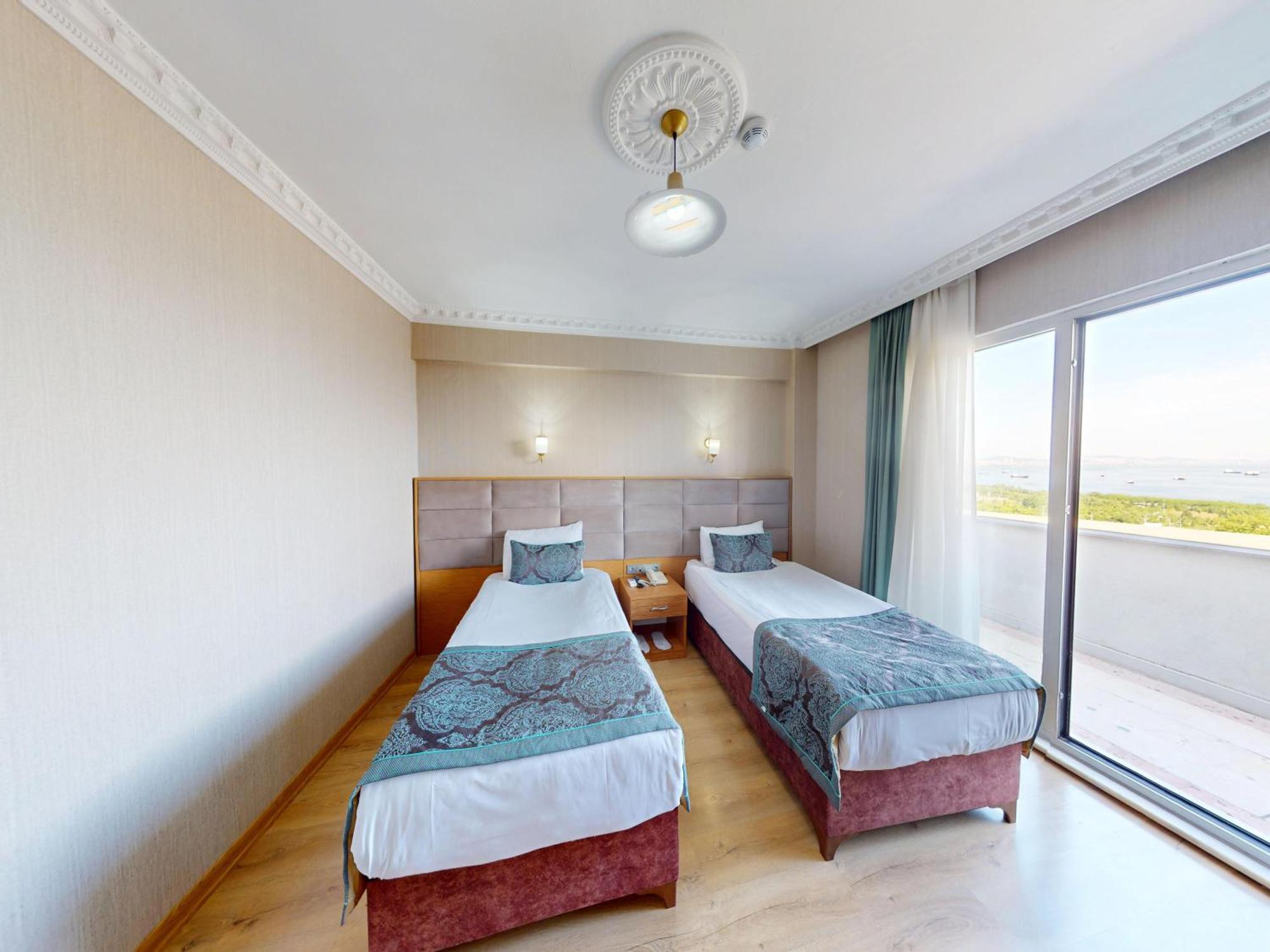 Chambre Double ou Lits Jumeaux Deluxe - Vue sur Mer