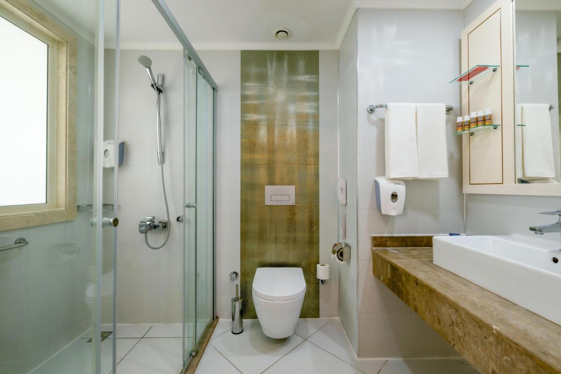 Standard Triple Room with Side Sea View