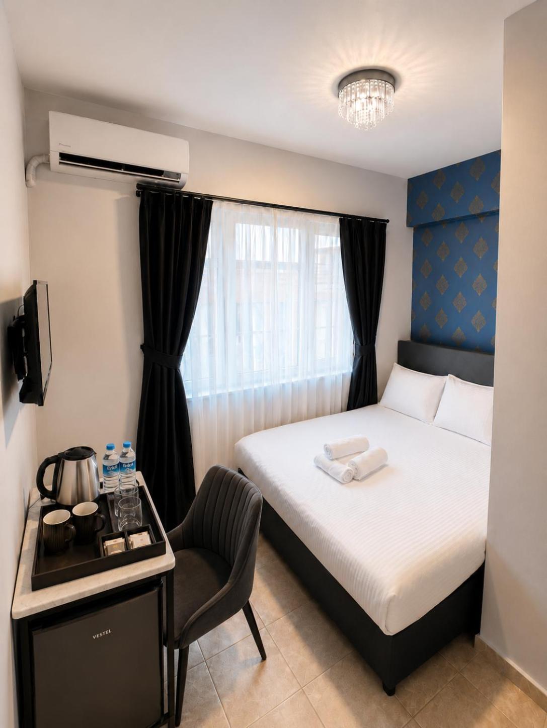 Deluxe Üç Kişilik Oda
