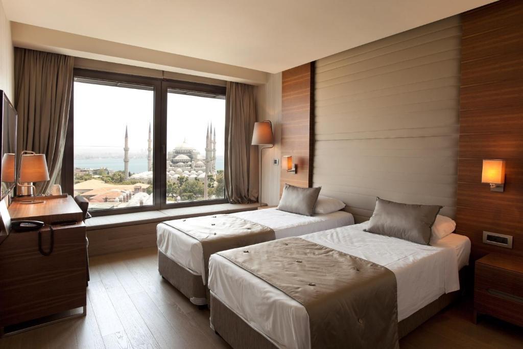 Quarto com Cama de Casal ou 2 Camas de Solteiro e Vista do Mar