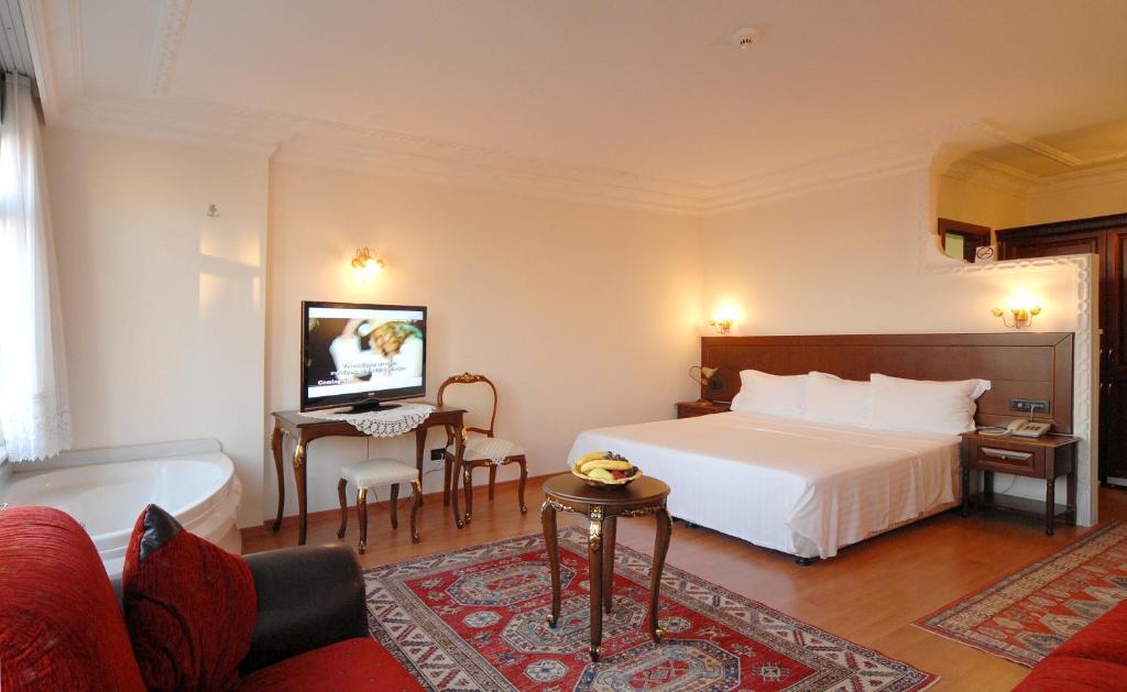 Suite Familiar con bañera de hidromasaje y vistas al mar