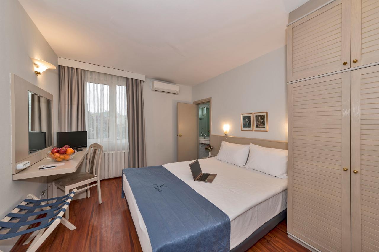 Quarto Standard com Cama de Casal ou 2 de Solteiro
