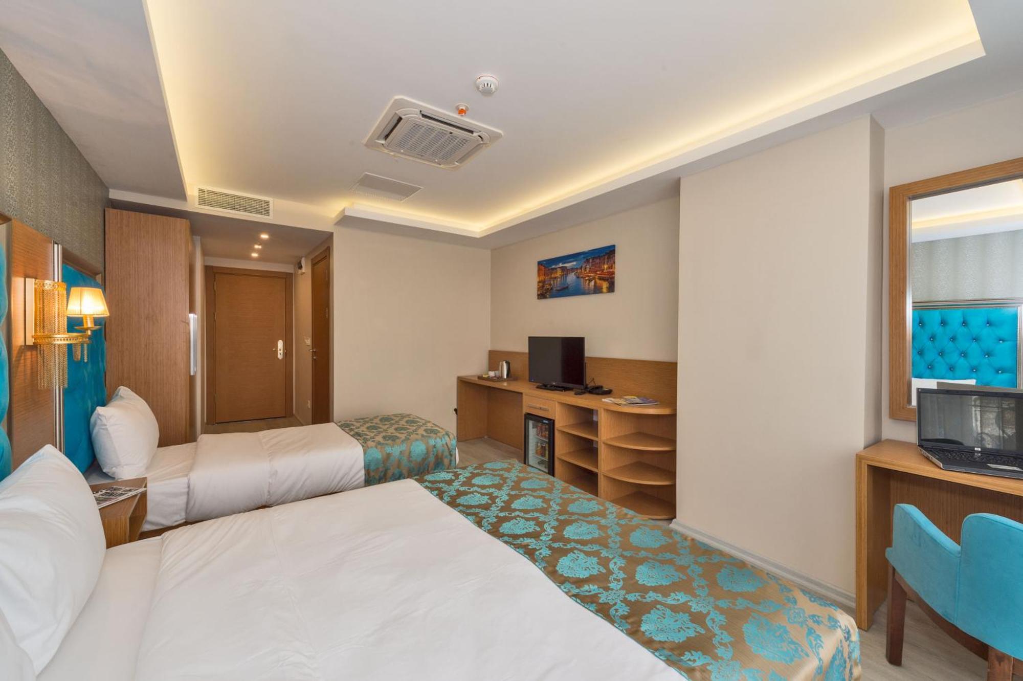Deluxe Triple Room
