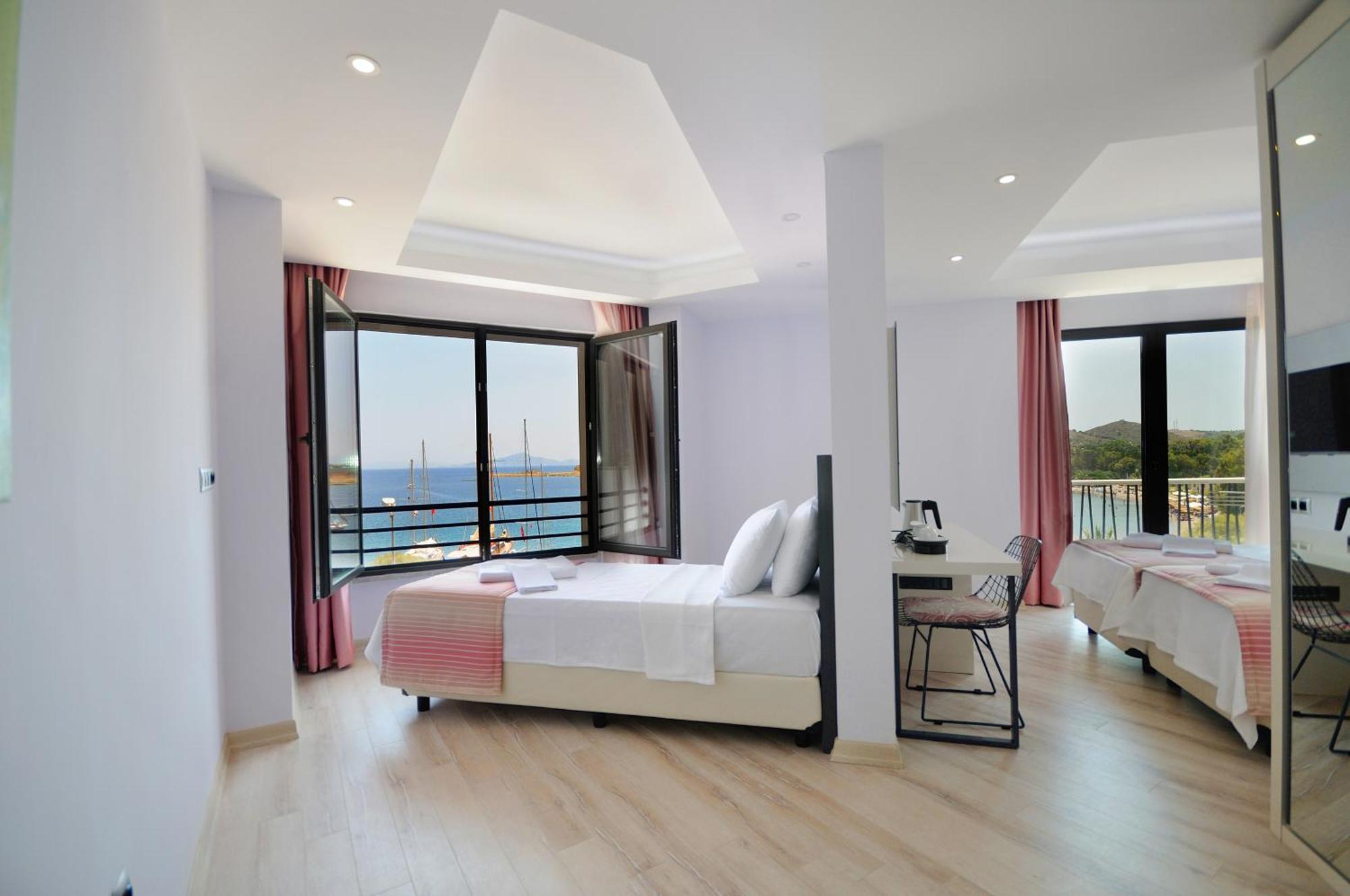 Dreibettzimmer mit Meerblick