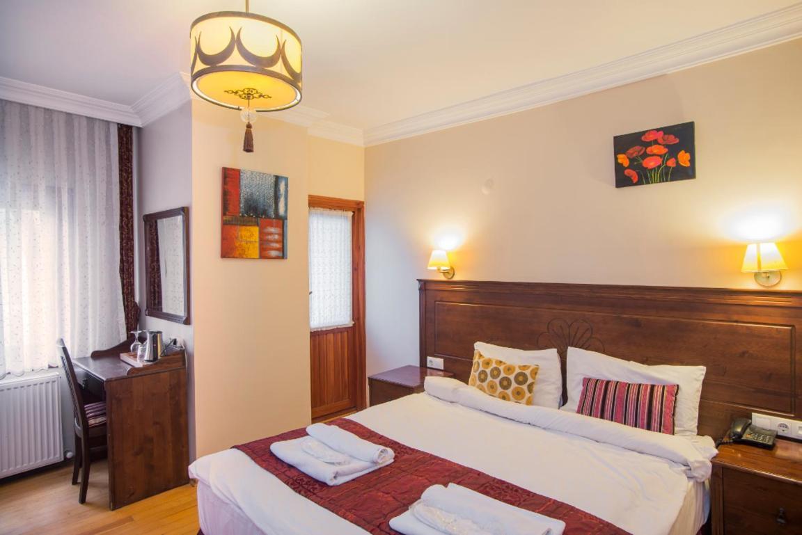 Quarto Deluxe com Cama de Casal ou 2 de Solteiro e Varanda