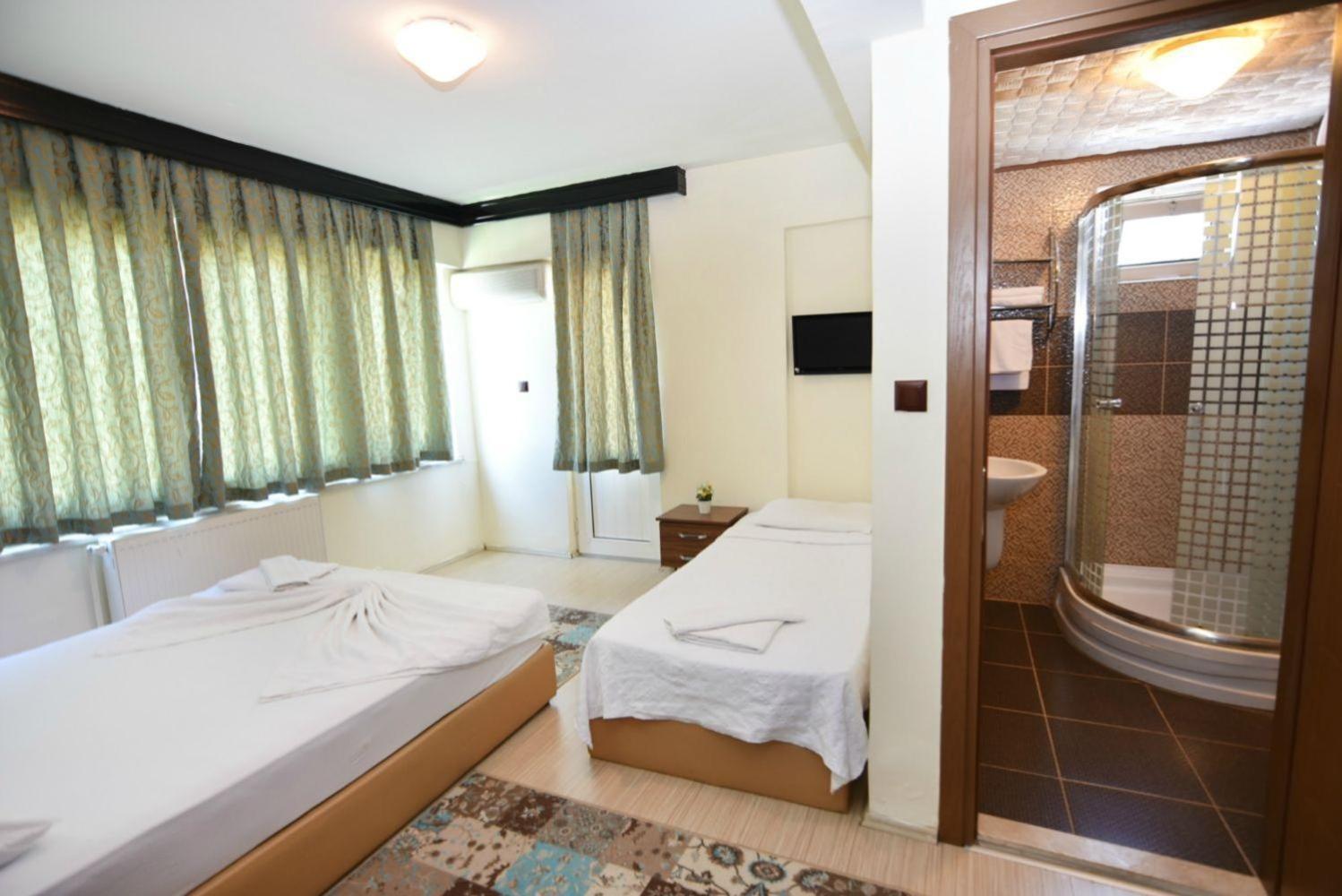 Deluxe Üç Kişilik Oda - Deniz Manzaralı