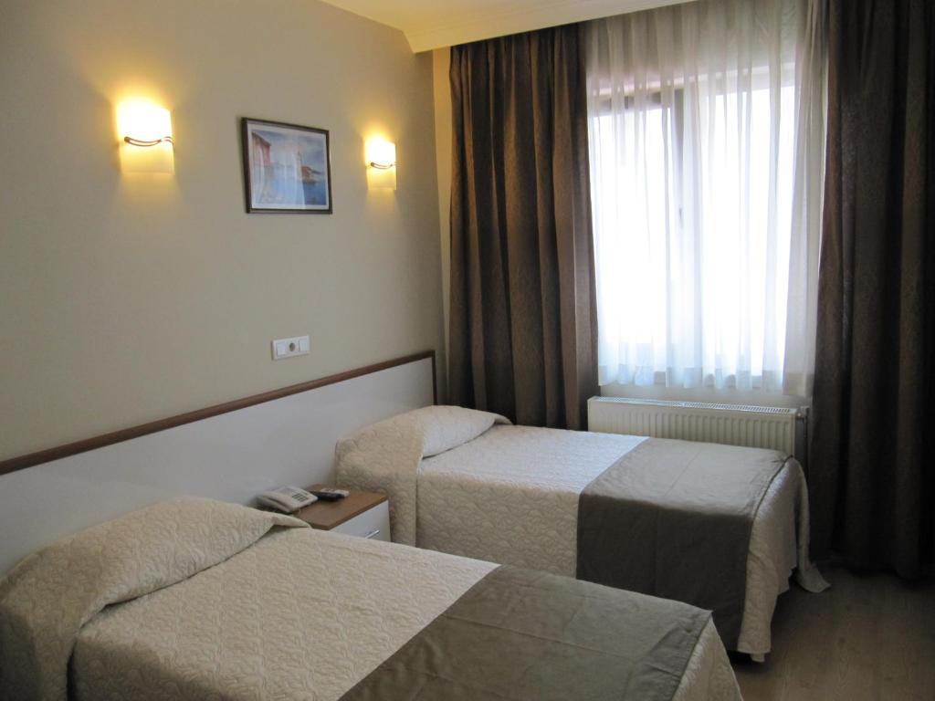 Quarto Standard com Cama de Casal ou 2 de Solteiro