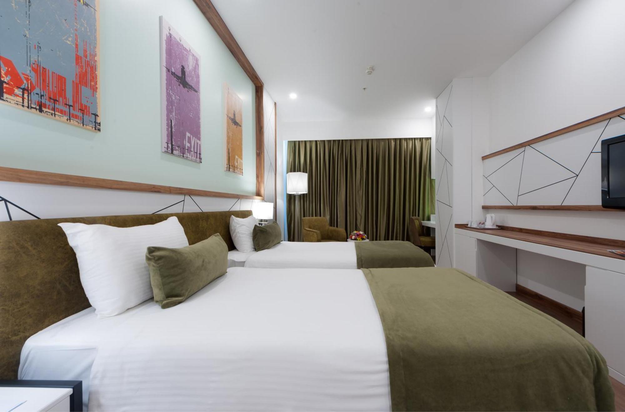 Quarto Deluxe com Cama de Casal ou 2 de Solteiro